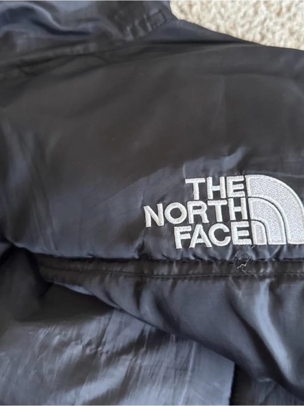 The North Face Black Jacket with White Logo